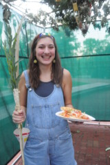 2010 Sukkot, student with pizza (photo courtesy of Rev. Rob Spach)